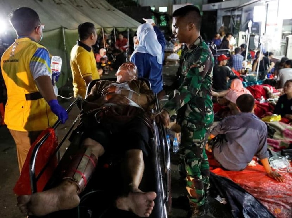 Indonesia chạy đua tìm người sống sót sau động đất kinh hoàng - 3 Indonesia chạy đua tìm người sống sót sau động đất kinh hoàng - 3