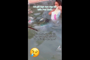 Cô gái Nga nhặt rác trên bãi biển Phú Quốc