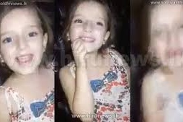 Xót xa hình ảnh bé gái Syria ca hát trước khi ngôi nhà bị dội bom