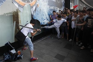 Nhật đóng cửa nhà máy ở Trung Quốc, Mỹ kêu gọi kiềm chế