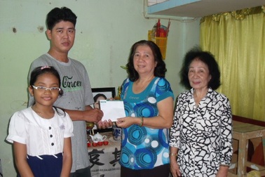 Quà bạn đọc đến với gia đình người phụ nữ bị sát hại ở chung cư