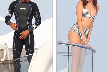 Siêu mẫu trẻ đẹp khoe dáng gợi cảm bên tay đua công thức một