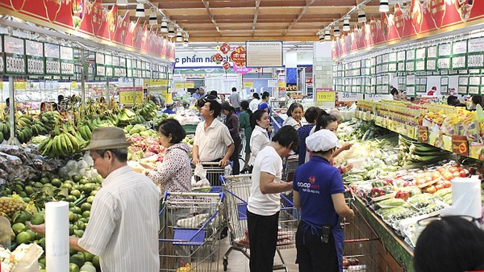Rằm tháng Giêng đông người đi chợ mua sắm - Ảnh 1. Rằm tháng Giêng đông người đi chợ mua sắm - Ảnh 1.