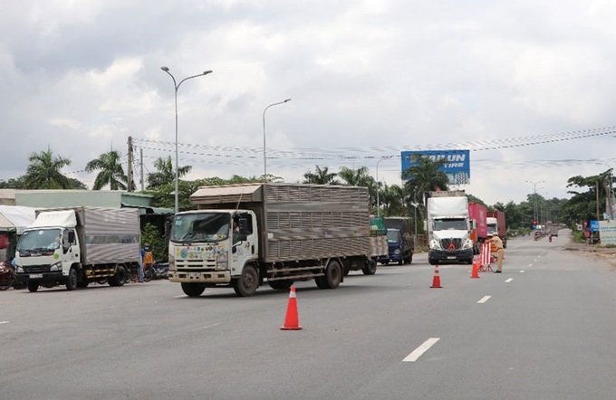 Tăng cường kiểm soát trật tự an toàn giao thông gắn với phòng, chống dịch Covid-19 - Ảnh 1. Tăng cường kiểm soát trật tự an toàn giao thông gắn với phòng, chống dịch Covid-19 - Ảnh 1.