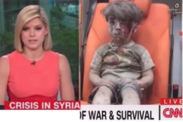 MC của CNN bật khóc ngay trên sóng khi đưa tin về em bé Syria