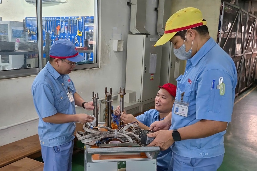 Hơn 96% lao động trở lại nhà máy làm việc sau Tết - 1