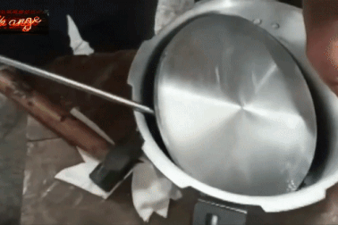 Hành khách giấu 700 gram vàng trong đáy nồi áp suất