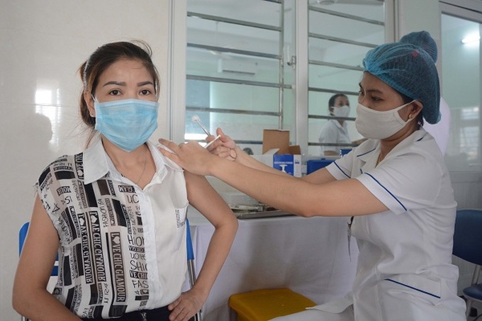 Bộ Y tế cảnh báo tình trạng lừa đảo tiêm vaccine phòng COVID-19 - Ảnh 1.