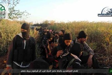 Các chiến binh thánh chiến hoảng sợ quay súng giúp Assad