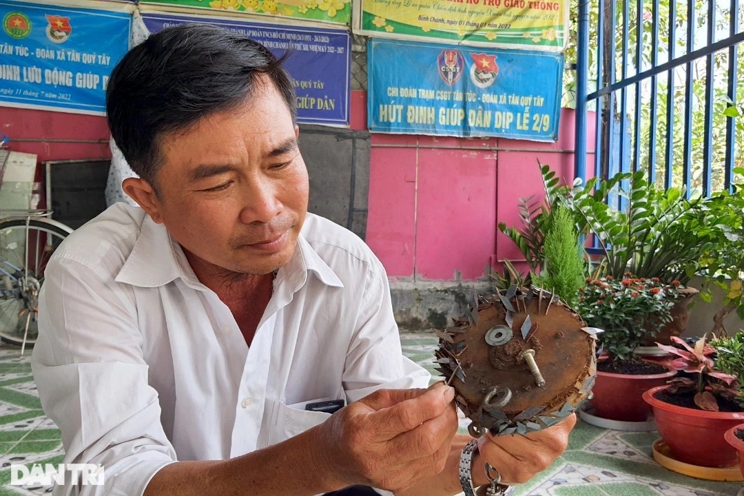Ba người đàn ông hút đinh miễn phí giúp người dân an toàn những ngày Tết - 4 Ba người đàn ông hút đinh miễn phí giúp người dân an toàn những ngày Tết - 4