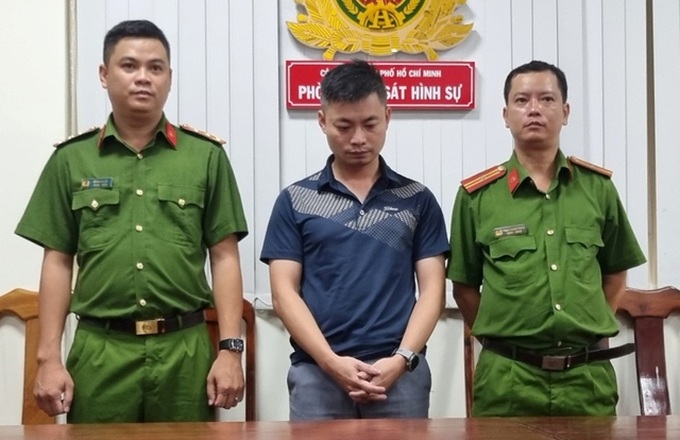 Lại Thái Phong tại cơ quan công an.
