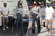 Pax Thien liên tục là người hộ tống mẹ nuôi Angelina Jolie xuống phố