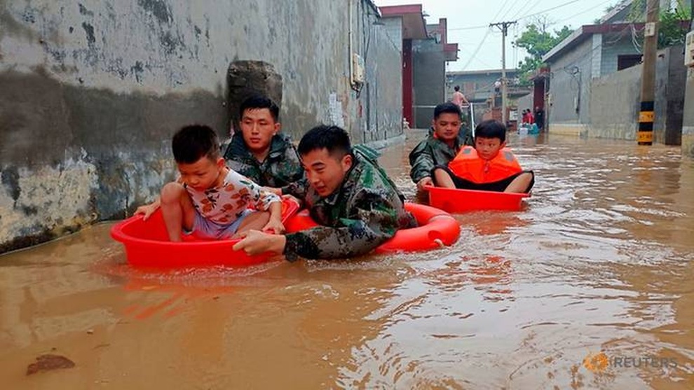 Trung Quốc cấp tập sơ tán dân sau trận lũ lịch sử - 3 Trung Quốc cấp tập sơ tán dân sau trận lũ lịch sử - 3