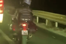 Xử phạt thế nào với tài xế lái mô tô che biển số chạy vào cao tốc?