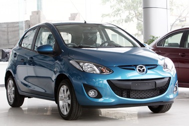 Giảm giá xe Mazda2 và xe Kia lắp ráp trong nước