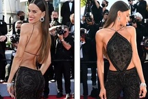 Bạn gái thủ môn Đức nổi bật với áo yếm không "nội y" tại LHP Cannes