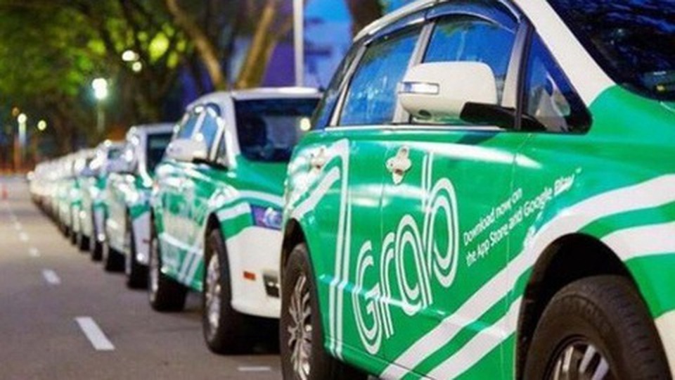 Quy định mới: Xe Grab phải dán phù hiệu, taxi truyền thống được “gỡ” hộp đèn - 1 Quy định mới: Xe Grab phải dán phù hiệu, taxi truyền thống được “gỡ” hộp đèn - 1