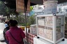 Vẫn công khai đổi tiền lẻ ở các đình, chùa