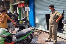 Cháy nhà ở trung tâm TPHCM, 4 người nhảy sang nhà hàng xóm thoát nạn