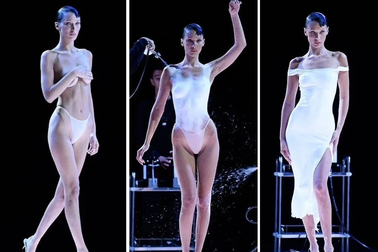 Bí mật sau màn trình diễn siêu mẫu bán khỏa thân được phun váy lên người