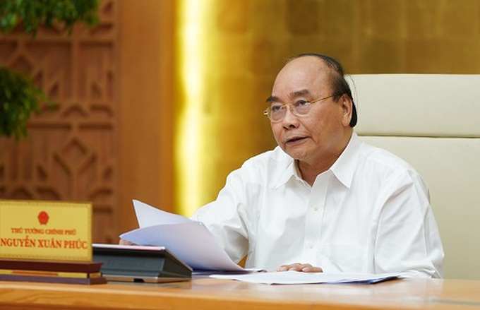 Thủ tướng: Tiếp tục mở các đường bay quốc tế có kiểm soát - Ảnh 1. Thủ tướng: Tiếp tục mở các đường bay quốc tế có kiểm soát - Ảnh 1.