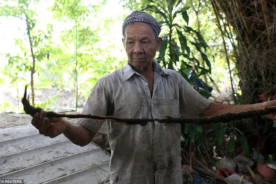 Dị nhân Việt Nam 80 năm không cắt tóc lên báo quốc tế - 5 Dị nhân Việt Nam 80 năm không cắt tóc lên báo quốc tế - 5