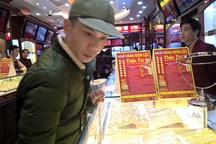 Tỷ giá trung tâm xuống thấp nhất 3 tuần, vàng bớt “lấp lánh”