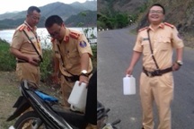 Hai CSGT mua xăng giúp cô gái dắt bộ xe trên đường