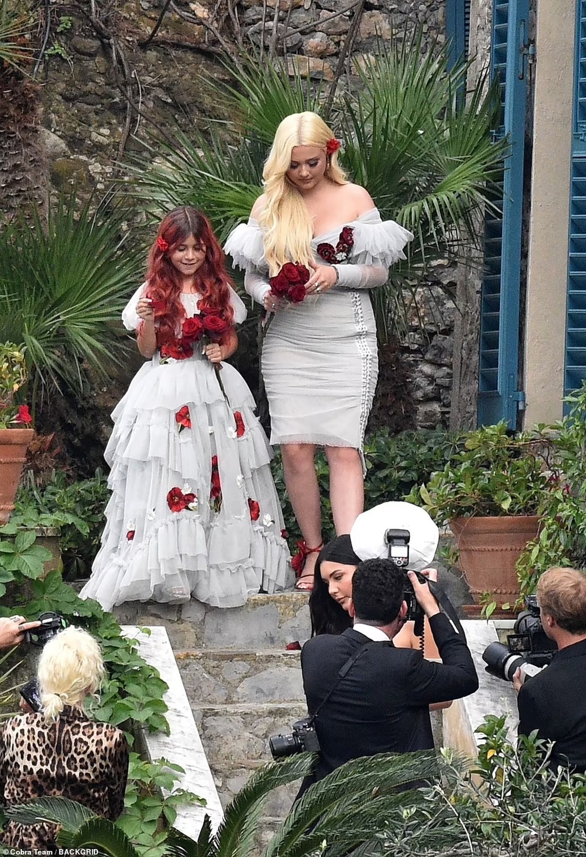 The Kardashian family flaunted their dresses at Kourtney's 3rd wedding - 9
