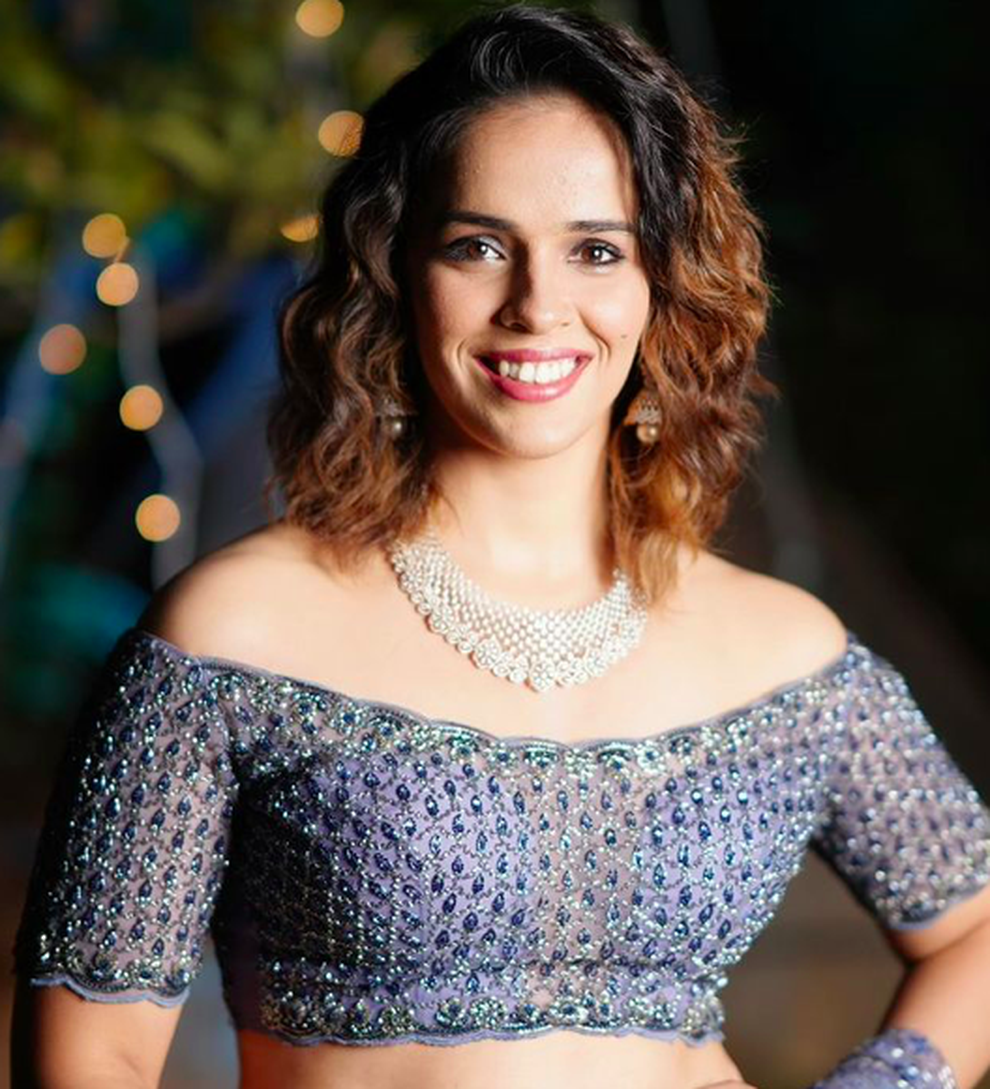 Nhan sắc xinh đẹp của nữ vận động viên cầu lông Ấn Độ - 1