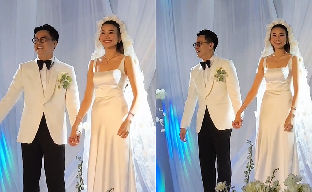 Khoảnh khắc chồng nhạc trưởng hôn Thanh Hằng trong lễ cưới xa hoa gây sốt - 1 Khoảnh khắc chồng nhạc trưởng hôn Thanh Hằng trong lễ cưới xa hoa gây sốt - 1