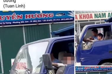 Xử phạt người đàn ông ngồi cạnh cháu bé lái xe tải