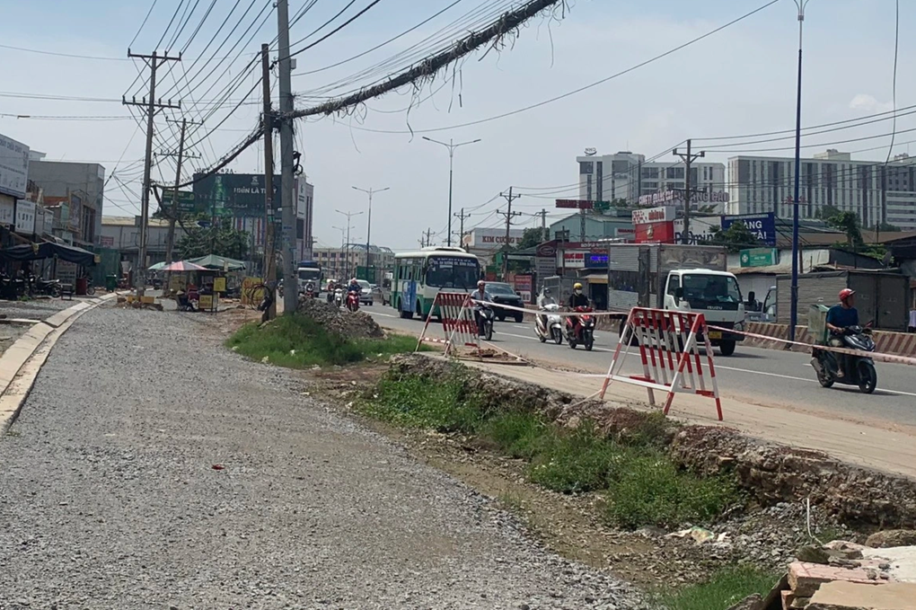 Dự án nâng cấp, mở rộng quốc lộ 13: Giải phóng mặt bằng khó khăn - 1 Dự án nâng cấp, mở rộng quốc lộ 13: Giải phóng mặt bằng khó khăn - 1