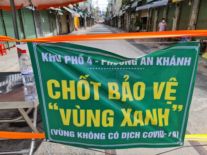 Phủ vaccnine để &quot;mở cửa&quot; - Ảnh 1.