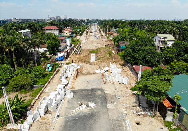 Cận cảnh đường nối ĐH Mỏ - Địa chất vào KCN Nam Thăng Long sắp hoàn thành - 2 Cận cảnh đường nối ĐH Mỏ - Địa chất vào KCN Nam Thăng Long sắp hoàn thành - 2