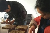 Trung Quốc: Mang 60 kg tiền xu đi mua xe tải