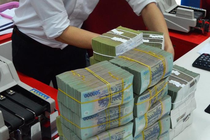 Ngân hàng Nhà nước giảm lãi suất điều hành 0,3-0,5%/năm.