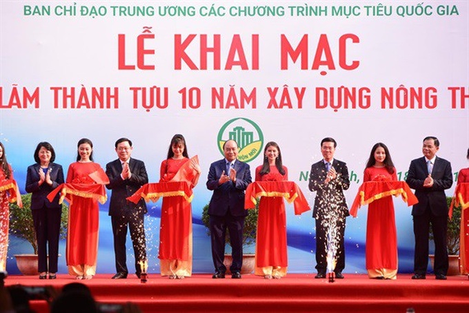 Khai mạc triển lãm thành tựu 10 năm xây dựng nông thôn mới - Ảnh 2.