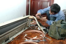 Thợ sửa điều hòa "kiếm bộn" ngày nóng