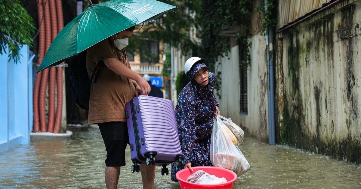 Lũ sông Hồng lên đột ngột, người Hà Nội hối hả kê cao đồ, sơ tán khỏi chỗ ở - 5