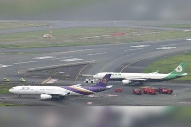 Máy bay chở 264 người vỡ cánh vì va chạm với phi cơ khác ở Nhật Bản