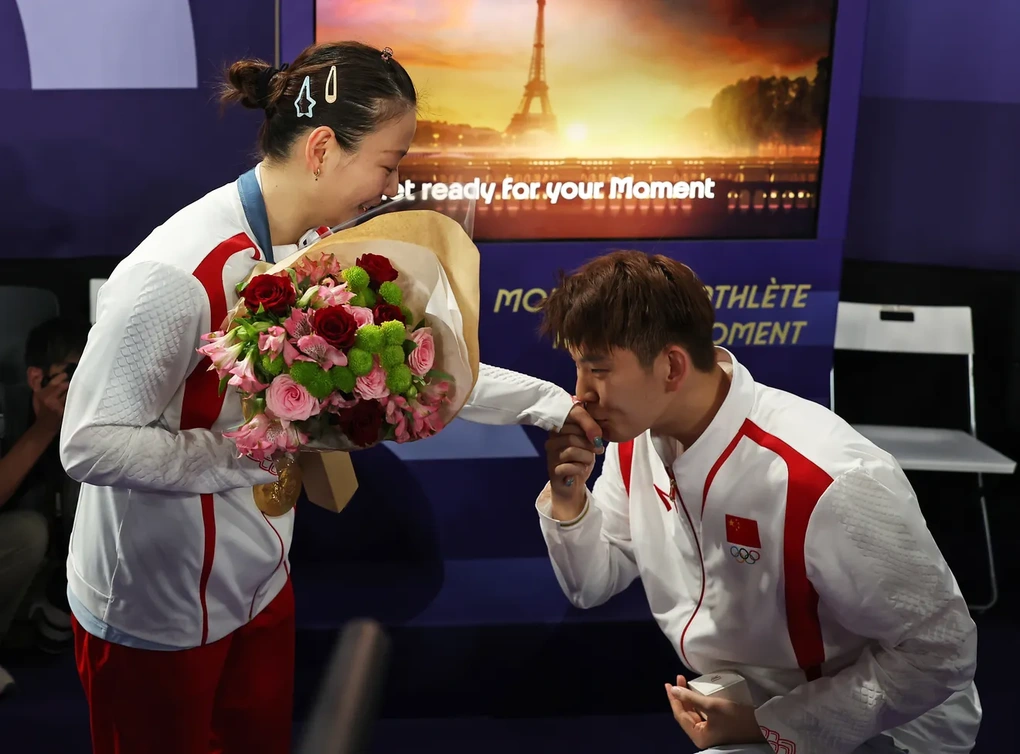 Nữ VĐV giành huy chương vàng Olympic và được cầu hôn trong cùng một ngày - 6 Nữ VĐV giành huy chương vàng Olympic và được cầu hôn trong cùng một ngày - 6