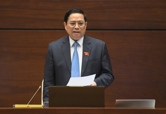 Thủ tướng Chính phủ Phạm Minh Chính làm rõ các vấn đề liên quan và trả lời chất vấn của đại biểu Quốc hội.