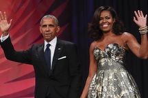 Vợ chồng ông Obama ký hợp đồng kỷ lục 60 triệu USD viết hồi ký