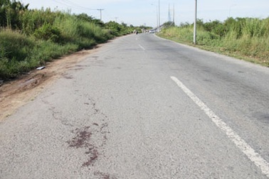 Chém đứt tay cô gái, cướp tài sản trên đường dẫn cầu Phú Mỹ