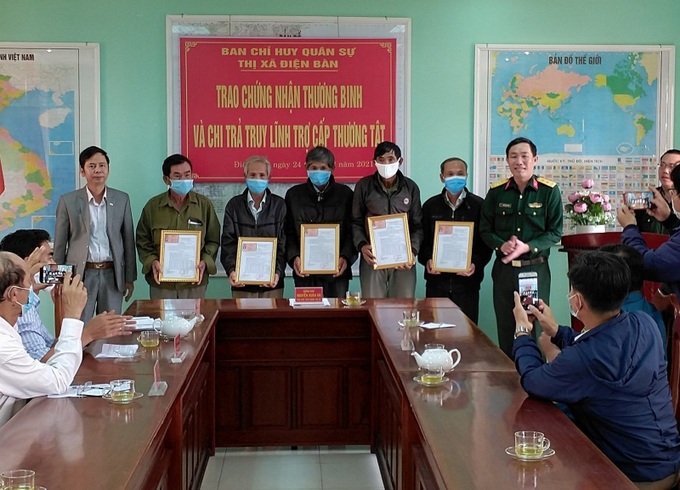 anh3 trao trả CN Quang nam