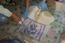 Người phụ nữ giấu gần 12.000 viên ma túy trong túi gạo nếp