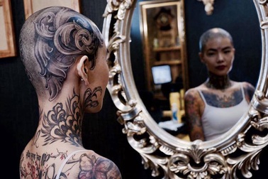 Cô gái Sài Thành cạo trọc, xăm kín đầu vì muốn lập kỷ lục
