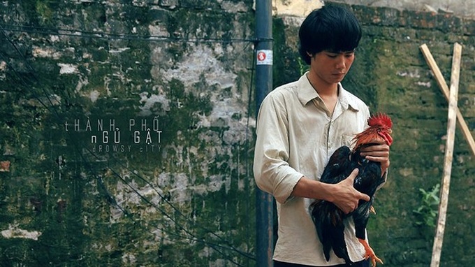 Quốc Toàn đóng anh chàng mổ gà trong phim Thành phố ngủ gật.