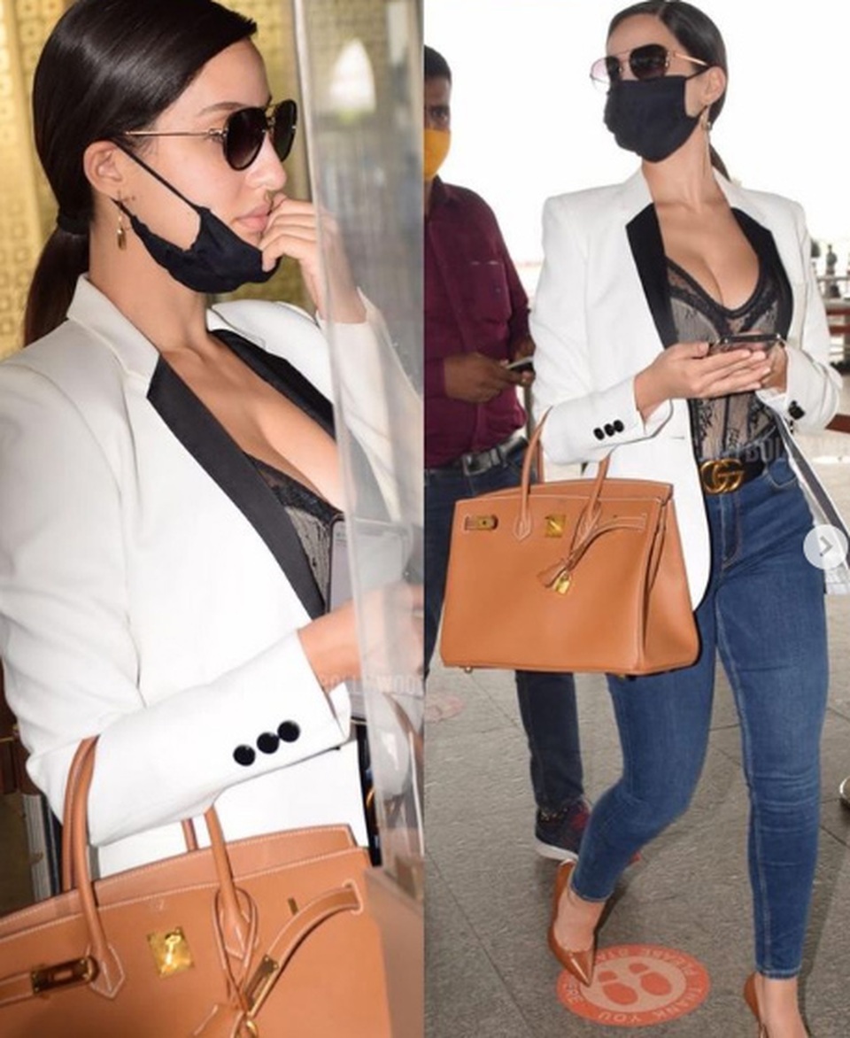 Mặc hở bạo tại sân bay, kiều nữ Nora Fatehi bị thợ săn ảnh Ấn Độ đeo bám - 1 Mặc hở bạo tại sân bay, kiều nữ Nora Fatehi bị thợ săn ảnh Ấn Độ đeo bám - 1